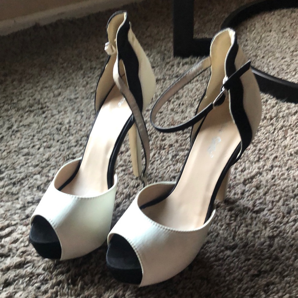 Cream and black satin high heels with ankle strap